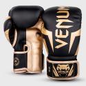 Venum Elite boxing gloves black / gold